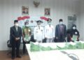 Bupati dan Wakil Bupati Konsel saat foto bersama penerima sertifikat tanah masyarakat transmigrasi. Foto: Istimewa